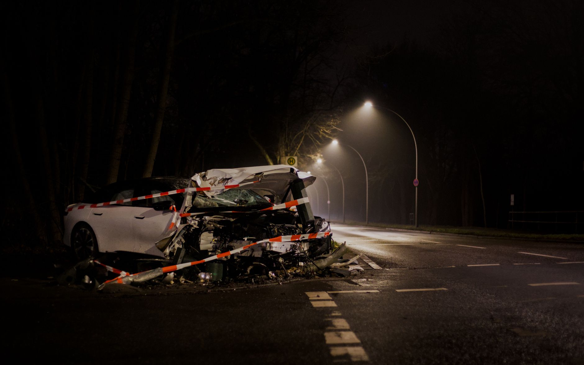 The scene of a vehicle collision on a roadway