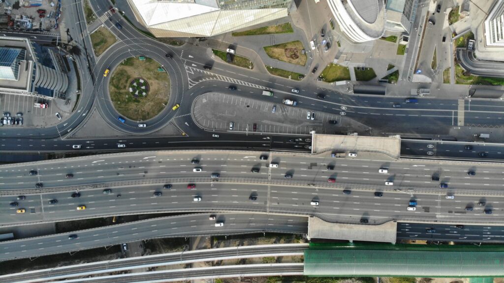 Vehicles crossing a marked city intersection