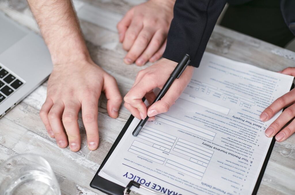 Auto insurance policy paperwork on a desk