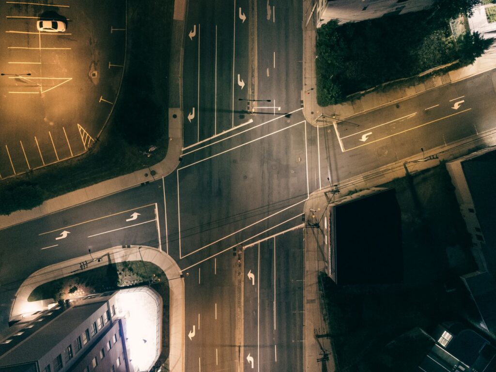 Aerial view of an empty city intersection at night