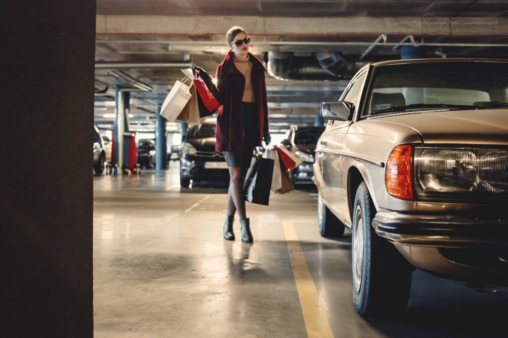 A driver reversing out of a parking space